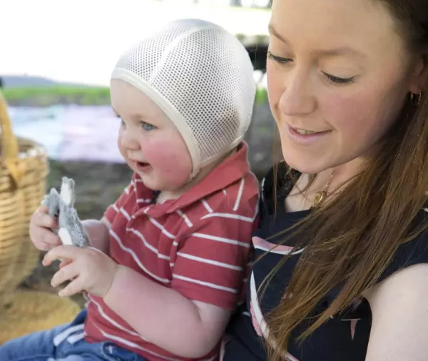 Mum holding a baby
